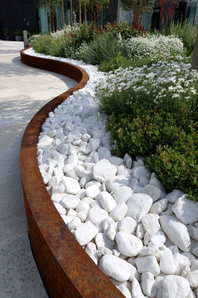 Rusted Metal and Pebble Garden Edging