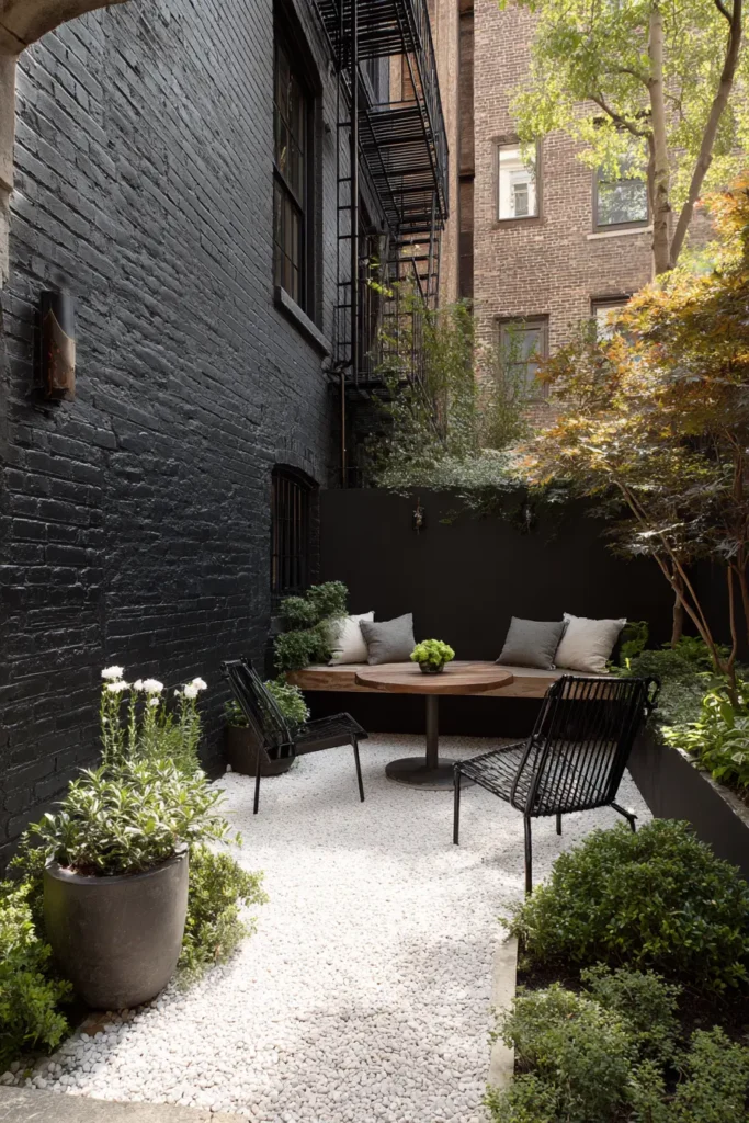 Modern Gravel Courtyard with Yellow Flowers